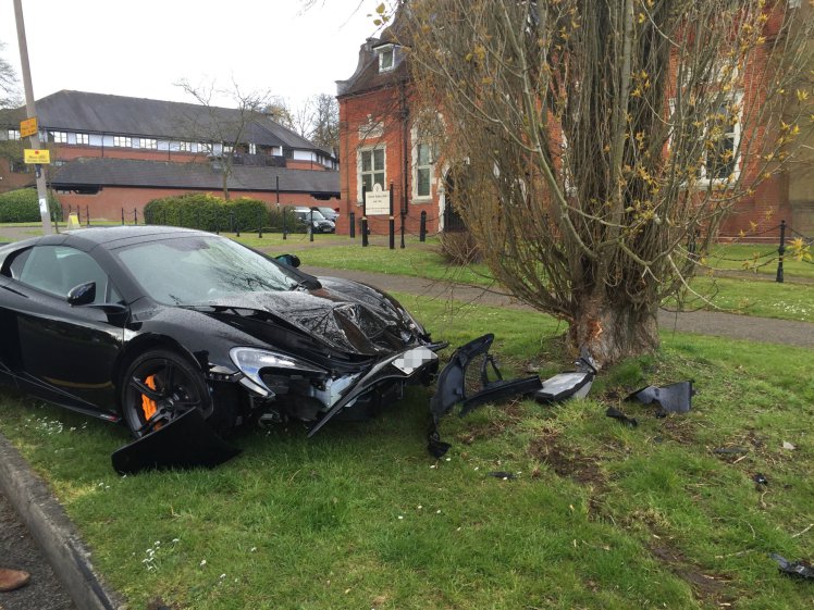 The crashed McLaren 650S Spider in Brentwood. See Masons copy MNMCLAREN: A brand new supercar worth over £200,000 ended up as a crumpled mess after it smashed into a tree Ò less than 10 minutes after it had been delivered. Residents in Hutton saw the car's owners celebrating with a bottle of champagne as the sparkling McLaren 650S Spider was unloaded last Wednesday, April 28. But only moments later the car was seen crashing into a tree in Poplar Drive in Brentwood at around 2.40pm. The McLaren 650S Spider can cost over £215,000 new, can go from 0 to 62mph in just three seconds and has a top speed of 204mph.
