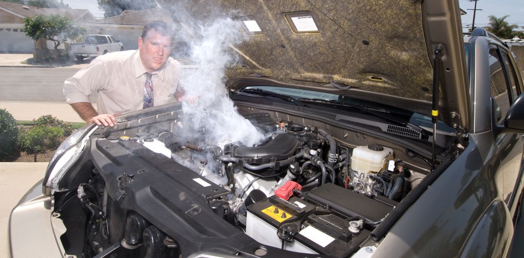 Man And His Over Heated Car